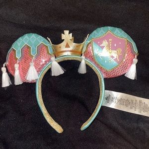Selling Disneys 50th anniversary Prince Charming ears.
